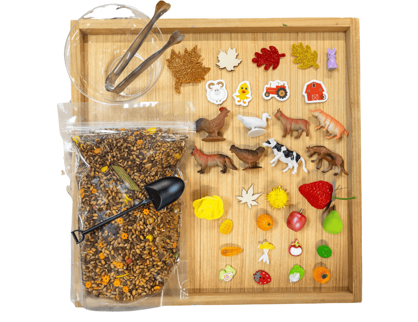 Close-up of farm sensory bin filler featuring colorful sensory materials for preschool sensory play and sensory table activities.