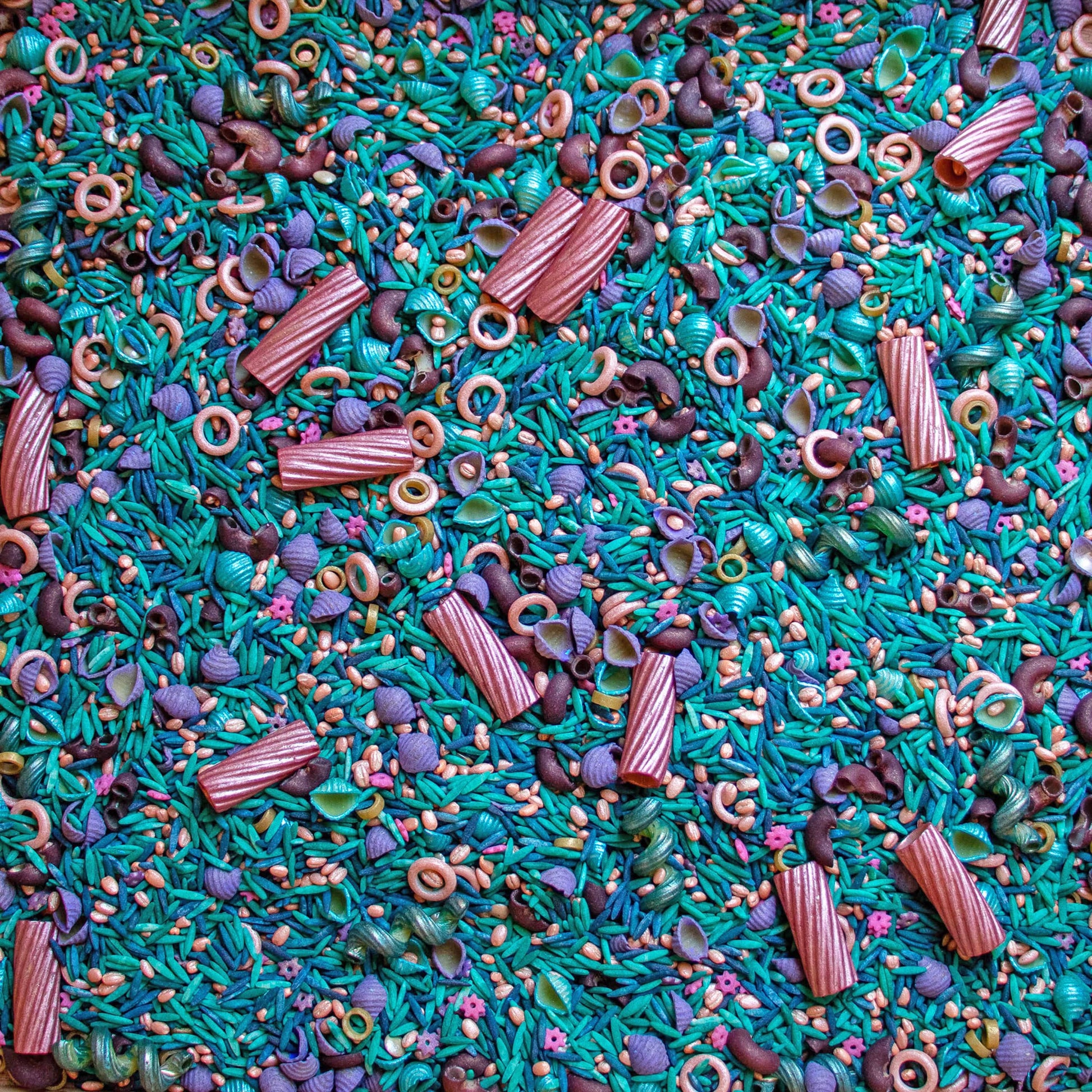 sensory bin for toddlers, rainbow rice sensory bin, activities for 3 year olds, quiet play ideas, independent play activities, Montessori sensory play, preschool sensory activities, gifts for autistic toddlers, busy toddler activities, play dough kits for kids, sensory bin filler, sensory filler, colored rice, sensory rice, ocean sensory play, ocean sensory bin